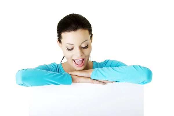 Portrait young happy woman with blank board — Stock Photo, Image