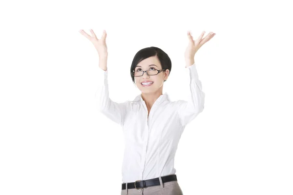 Woman is holding something abstract above her head. — Stock Photo, Image