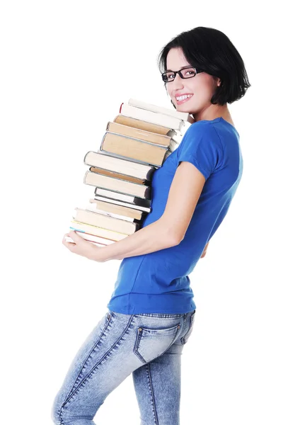 Jovem caucasiana (estudante) com livros — Fotografia de Stock