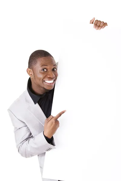 Businessman showing blank advertisement — Stock Photo, Image