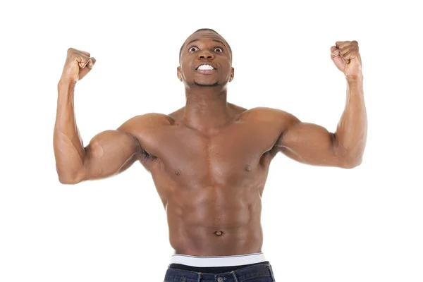 Well-built muscular black man with arms raised — Stock Photo, Image