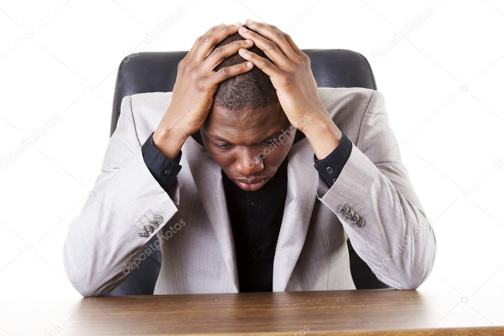 Sad, tired or depressed businessman