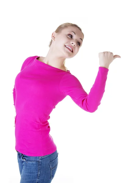 Happy , excited young woman pointing on copy space — Stock Photo, Image