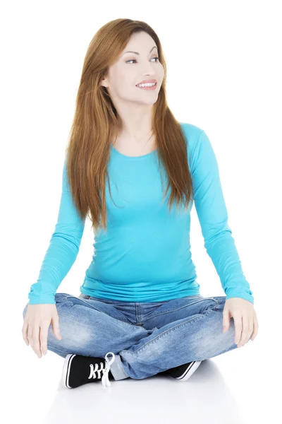 Happy attractive woman sitting — Stock Photo, Image