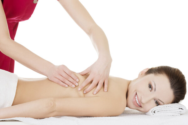 Preaty woman relaxing beeing massaged in spa