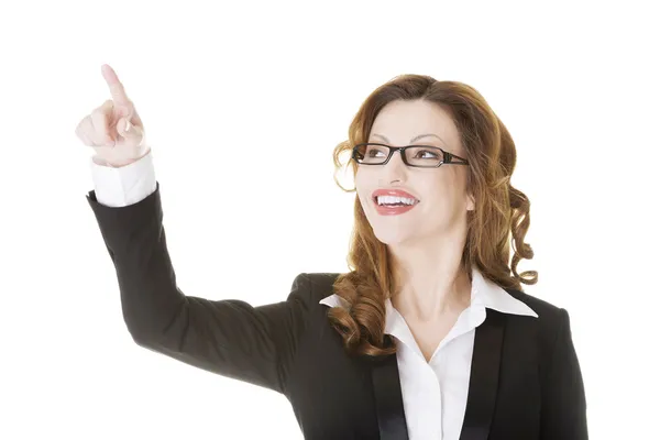 Attractive smiling businesswoman making choose — Stock Photo, Image