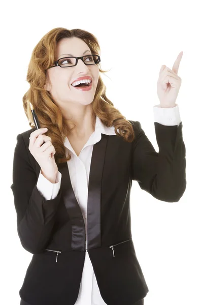 Happy business woman showing copy space Stock Picture