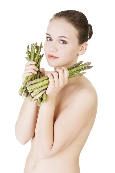 Mulher bonita com comida saudável - espargos — Fotografia de Stock