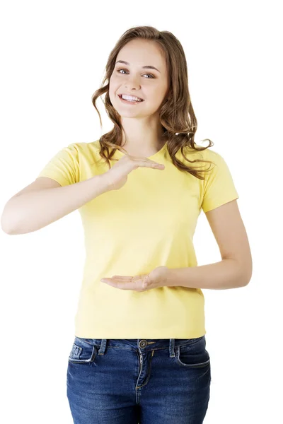Woman presenting copy space on her palm — Stock Photo, Image
