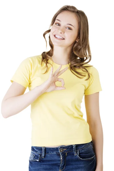 Beautiful success woman giving perfect gesture — Stock Photo, Image