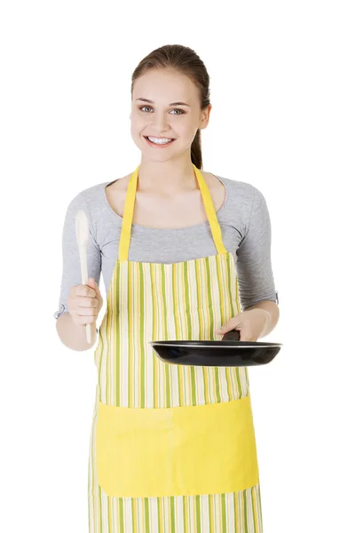 Young woman cooking healthy food — Stock Photo, Image