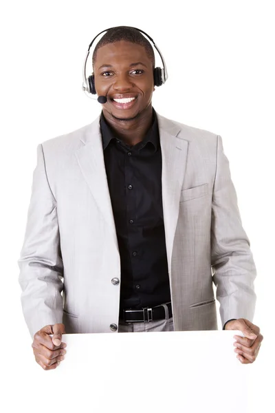 Trabalhador bem sucedido do call center com placa em branco — Fotografia de Stock
