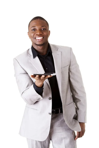 Pohledný podnikatel pracující v tabletovém počítači. — Stock fotografie