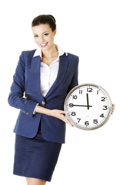 mutlu genç iş kadını Office saat tutan