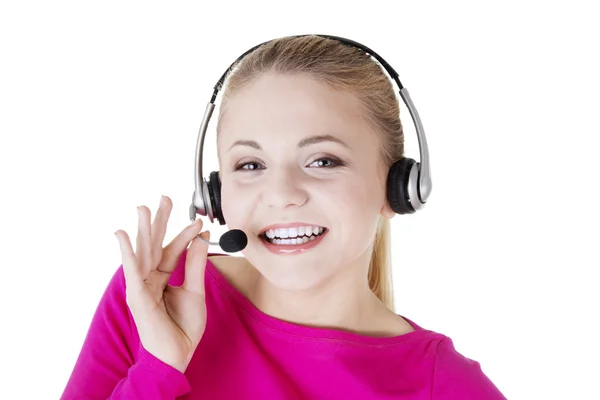 Young call-center assistant smiling — Stock Photo, Image