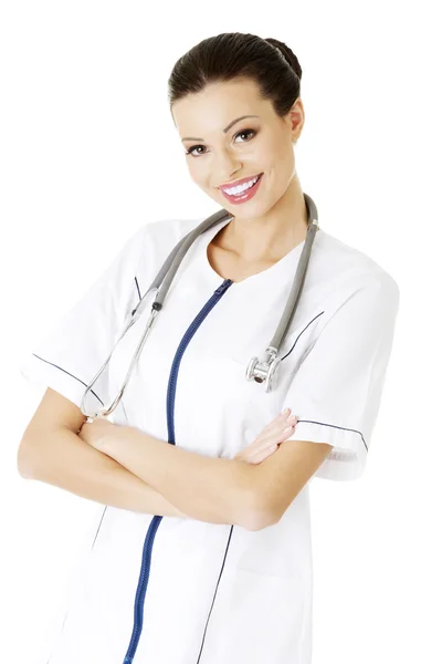 Nurse or young doctor standing smiling. Stock Image