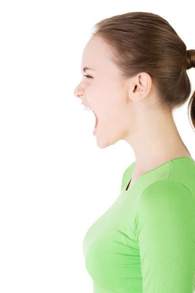 Young casual woman screaming with anger — Stock Photo, Image