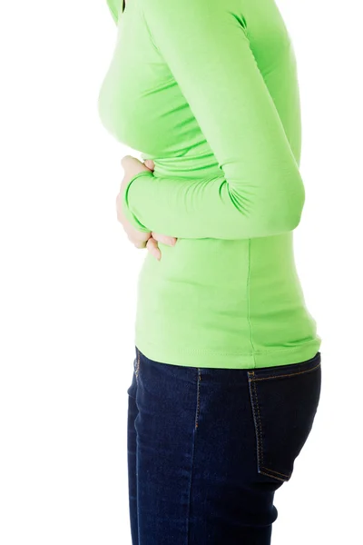 Ung kvinna med magen frågor — Stockfoto