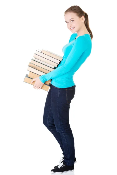 Jovem caucasiana (estudante) com livros — Fotografia de Stock