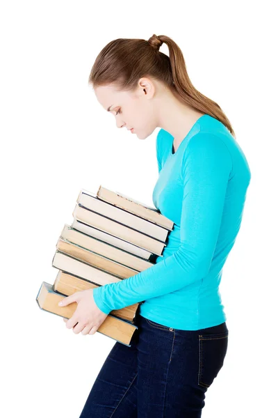 Jovem caucasiana (estudante) com livros — Fotografia de Stock