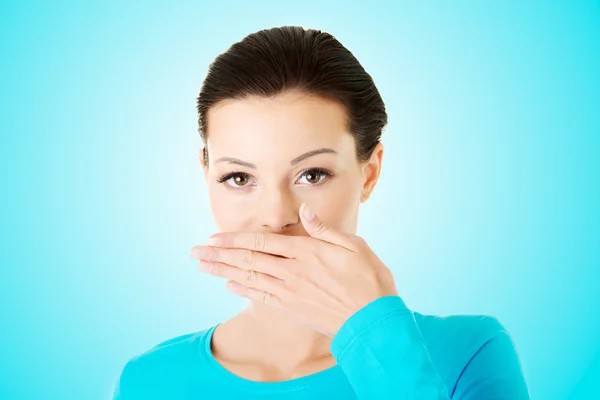 Woman covering mouth — Stock Photo, Image