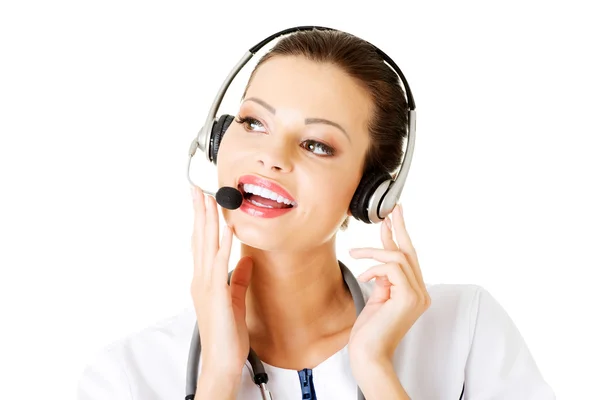 Mujer feliz médico con auriculares . —  Fotos de Stock