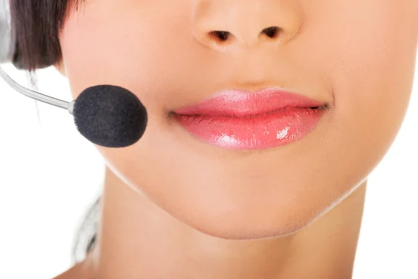 Beautiful young call-center assistant smiling — Stock Photo, Image