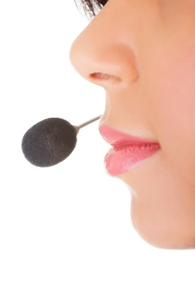 Beautiful young call-center assistant smiling — Stock Photo, Image