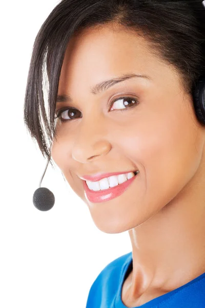 Beautiful young call-center assistant smiling — Stock Photo, Image