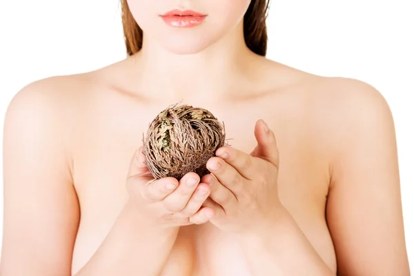 Beautiful spa woman holding Rose of Jericho — Stock Photo, Image