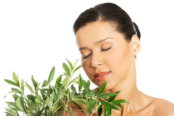 Woman with health skin and with olive tree — Stock Photo, Image