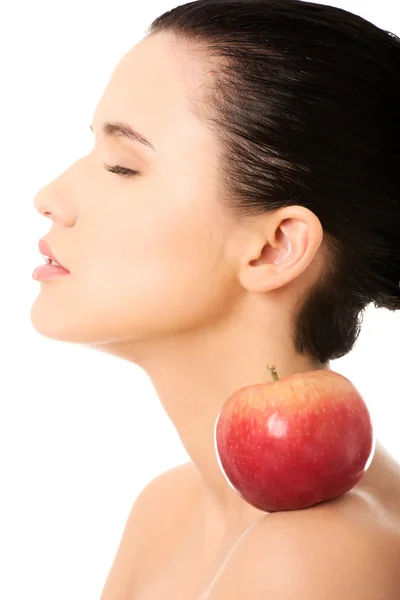 Beautiful woman with clean fresh healthy skin holding red apple. — Stock Photo, Image