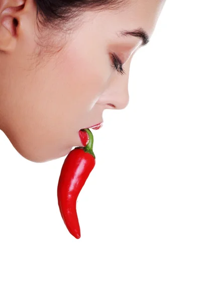 Beautiful woman lips with hot paprika — Stock Photo, Image