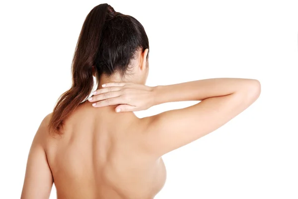 Young woman with pain in her back — Stock Photo, Image