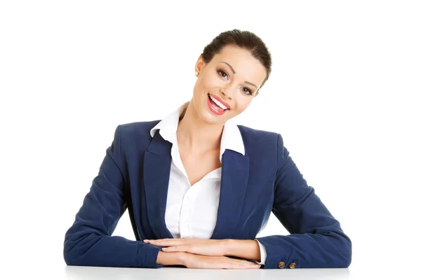 Business woman is sitting at the desk — Stock Photo, Image