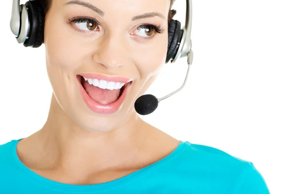 Beautiful young call-center assistant smiling — Stock Photo, Image