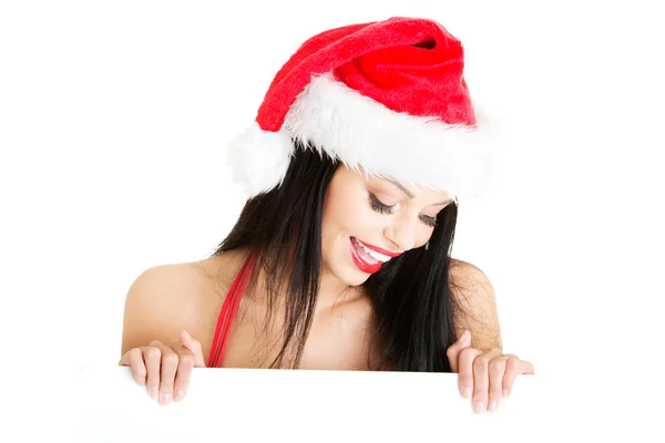 Santa girl hospodářství prázdná deska — Stock fotografie