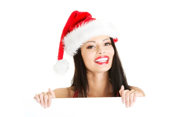 Santa girl holding blank board — Stock Photo, Image