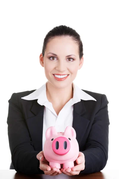 Szczęśliwy biznes kobieta z jej oszczędności na biurku — Zdjęcie stockowe