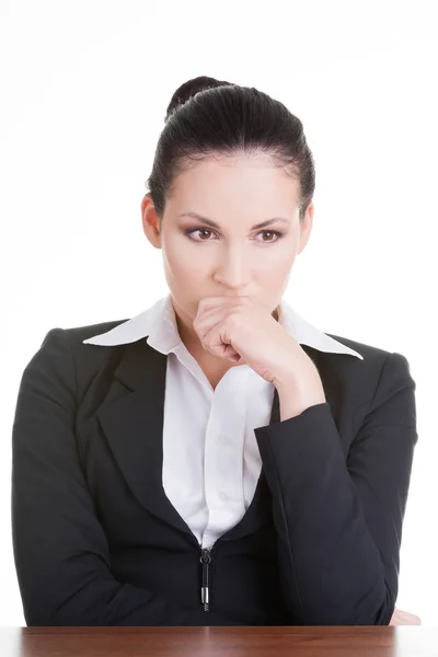 Sad business woman sitting behind the desk — Stock Photo, Image