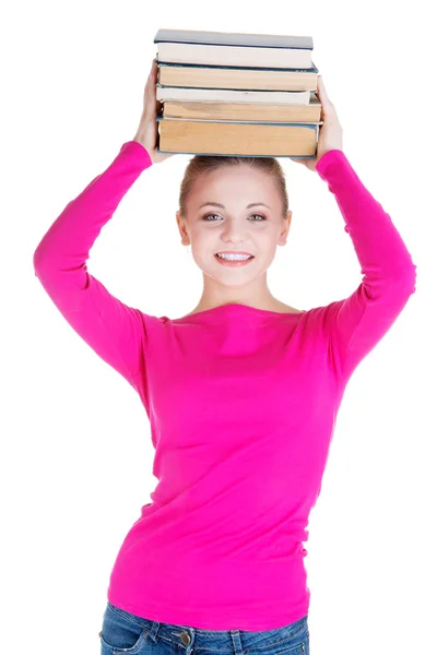 Mujer (estudiante) con libro en la cabeza — Foto de Stock