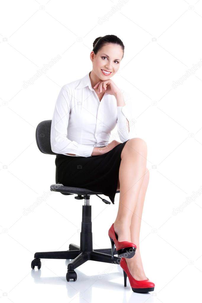 Businesswoman sitting on ofice chair