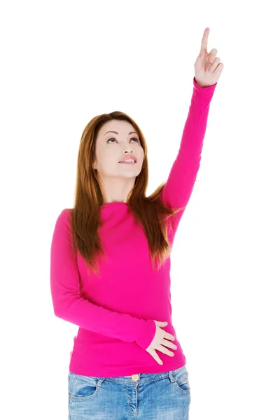 Happy , excited woman pointing on copy space — Stock Photo, Image