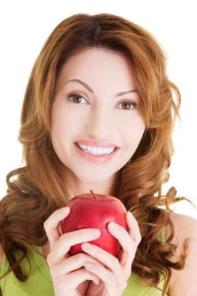 Schöne Frau mit rotem Apfel. — Stockfoto