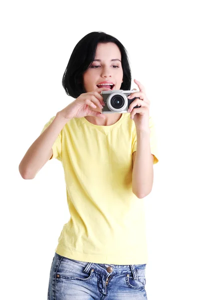 Närbild av en ung kvinna fotograf — Stockfoto