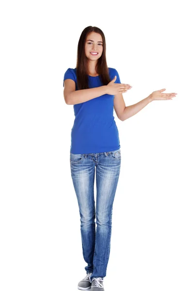 Happy , excited young woman pointing on copy space — Stock Photo, Image