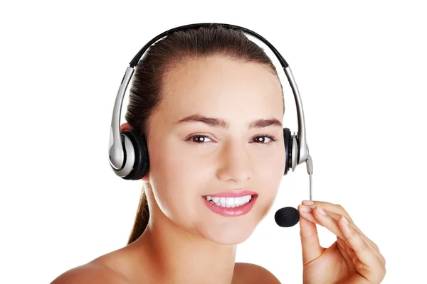 Beautiful young call-center assistant smiling — Stock Photo, Image