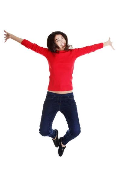 Feliz mujer caucásica saltando en el aire —  Fotos de Stock