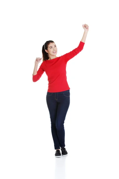 Mujer joven con los puños en alto — Foto de Stock