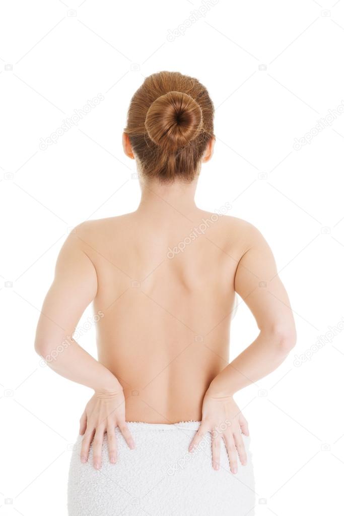 Woman with pain in her back.